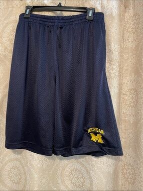 Pro Edge Men’s XL, Navy Athletic Mesh Shorts with Yellow Michigan Logo.